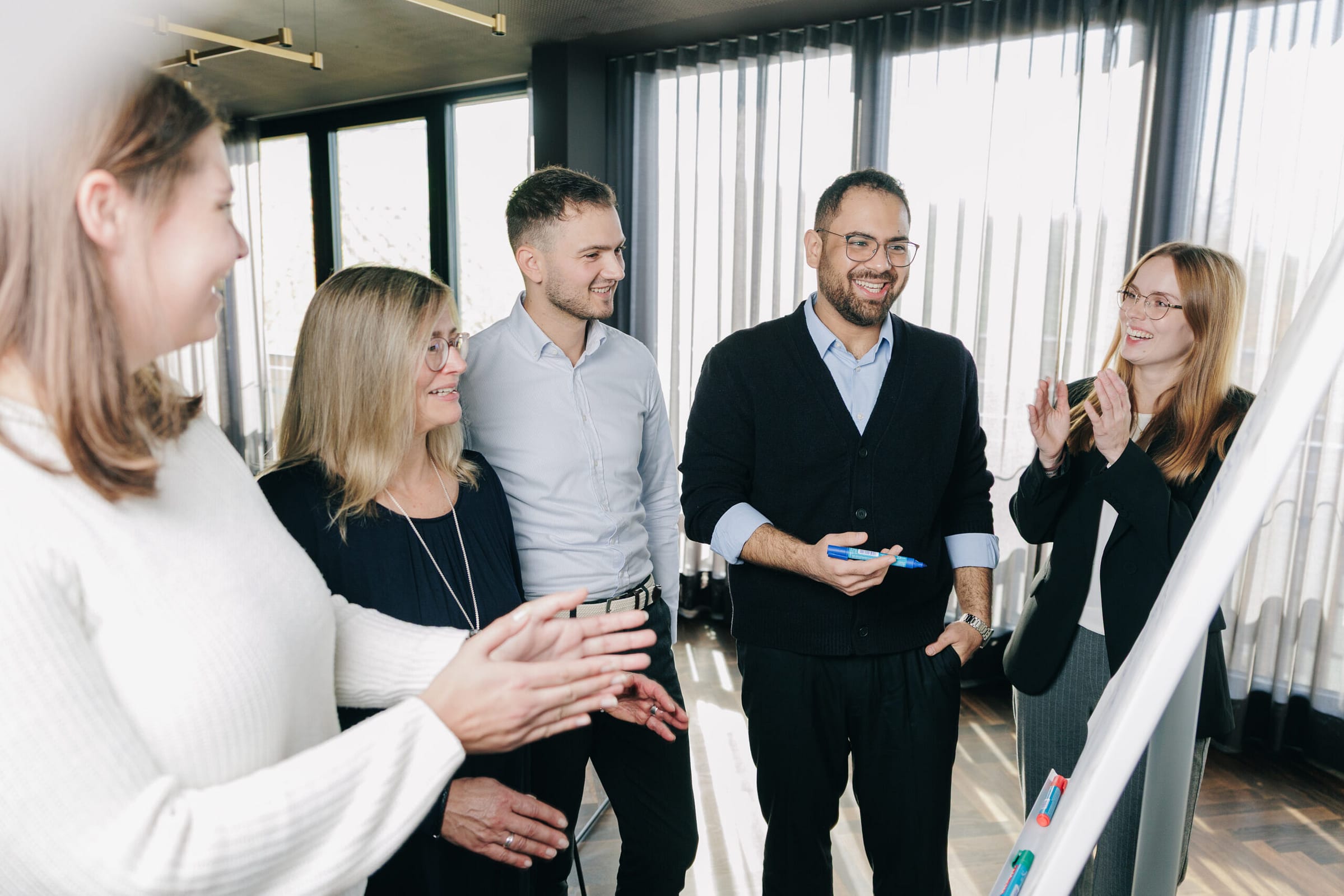 Team spirit at XEPTUM, fostered by joint events, flat hierarchies, and a motivated team dedicated to shared growth